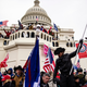 Pro-Trump insurgents storm the U.S. Capitol following a rally with President Donald Trump on January 6, 2021, in D.C.